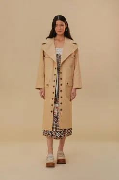 POCKETS OVER NUDE TRENCH COAT